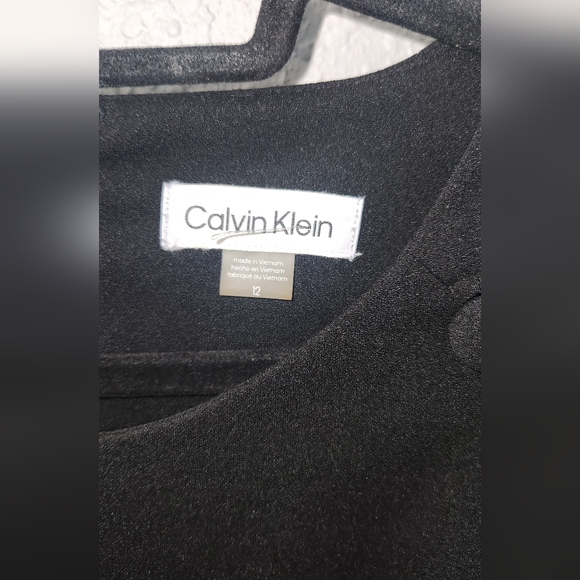 Calvin Klein Scuba Crepe Dress with Flutter Hem and Button Details - Picture 8 of 8